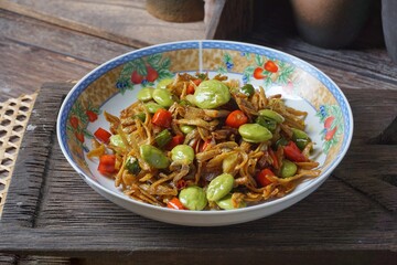 Malaysian dish dried anchovy with stink bean in hot chili sauce or Ikan Bilis Petai