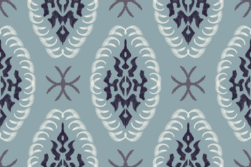 Floral Ikat pattern embroidery vector illustration. Blue motifs traditional ikat design seamless. Floral pattern on indigo blue background. Ikat ethnic oriental seamless pattern traditional. © Wita Pixs