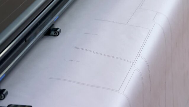 Close-up large plotter prints on whatman paper. Print patterns for sewing on paper using a large printer.	