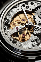 Black and white close view of watch mechanism