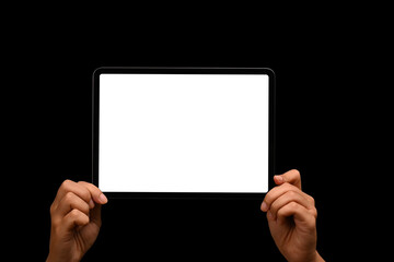 Woman hands holding digital tablet on black background. Blank screen for your text message or promotional content
