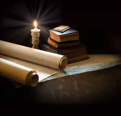 Still life from ancient books with candles