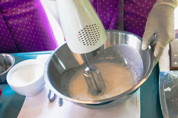 close up of a person preparing a meal