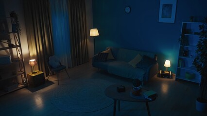 Picture of a flat, an apartment in the night. Muffled, low light, cozy room. Couch, sofa, table and other furniture in the room. Late night, after midnight.