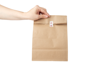 take away bag in hand isolated, grocery delivery, responsible lunch packaging