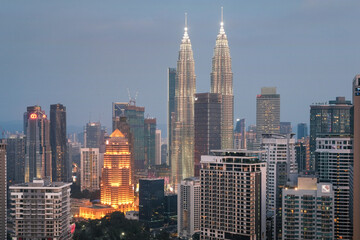 View of Kuala Lumpur and Petronas Twin Towers at blue hour, Malaysia.