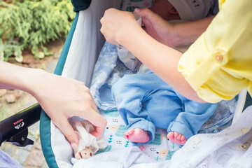 little baby legs in arms