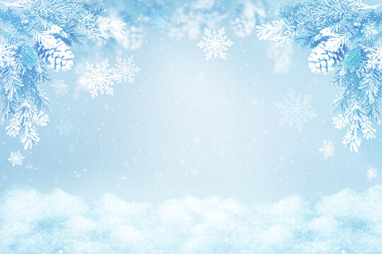 Winter blurred background with snowdrifts, sun rays and snowflakes. Abstract Winter scene