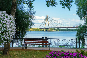 View of the modern green Natalka park and the embankment of the Dnipro river, Kyiv, Ukraine
