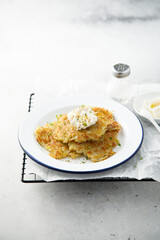 Homemade potato latkes with cream cheese