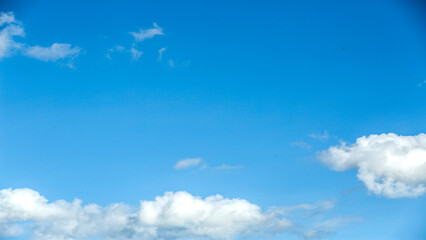 Naklejka na ściany i meble Clouds on the blue sky