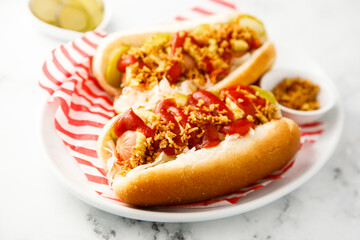 Traditional hot dogs with pickles