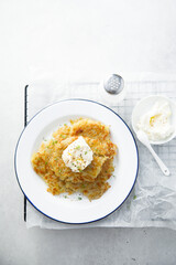 Homemade potato latkes with cream cheese