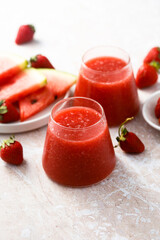 Refreshing watermelon drink with fresh strawberry