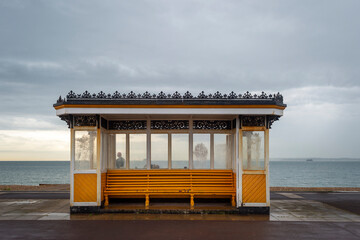 Painted Victorain shelter on Southsea sea front. Portsmouth, Hampshire.