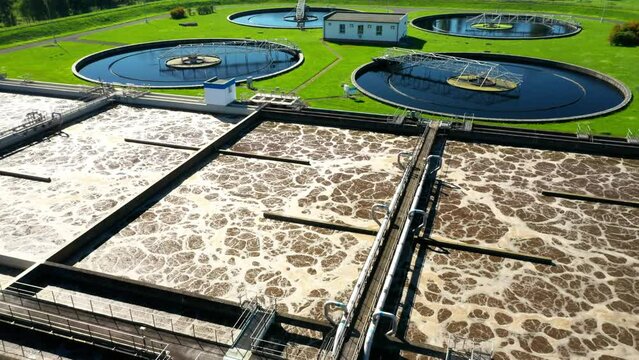 Sewage treatment plant from above. Grey water recycling. Waste management theme. Ecology and environment in European Union.