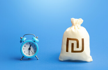 Time and israeli shekel money bag. Loans, mortgages. Deposits, savings. Retirement funds. ROI....