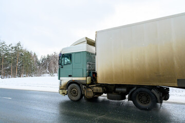 A semi-trailer truck, semitruck, tractor unit and semi-trailer to carry freight.