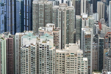 Obraz premium High rise apartment buildings in Hong Kong densely packed together 