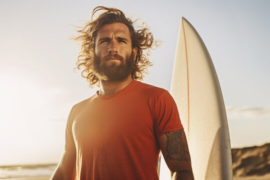 Bearded male surfer with surfboard, lifestyle portrait