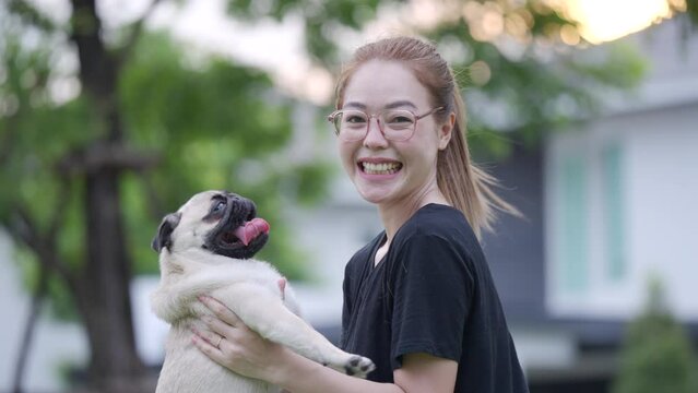 person with dog pug