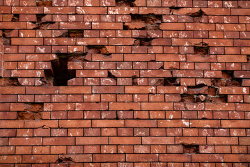 Belarus, Brest, August 2023: Brick wall with traces of shelling in the Brest fortress