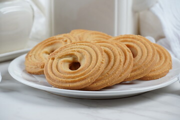 Sweet and tasty round butter cookies. Round ring shaped German spritz biscuits