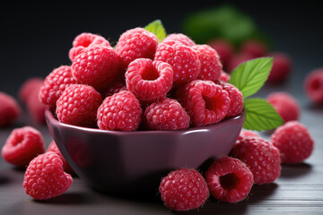 Red ripe raspberry berries in bowl