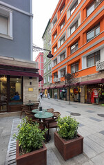 Street with cafe and restaurant tables. Restaurant tables on the street. Travel in Turkey.