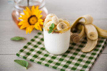 Sweet homemade yogurt with bananas and honey