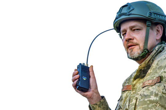 A walkie-talkie in the hand of a military man of Ukraine. Speak Ukrainian. Heart in the colors of the Ukrainian flag. Armed Forces of Ukraine. Clothes of a soldier in the army. Mocap.