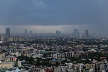 Fototapeta na wymiar Sky grey cloud and heavy rain in Bangkok city, Thailand.