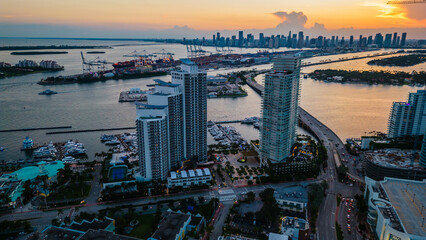 Aerial of miami skyline view from Miami South beach and Port during sunset 