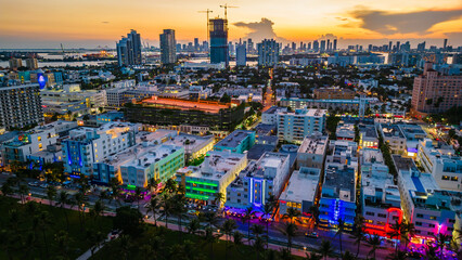 aerial drone above Miami South Beach Florida illuminated at night 