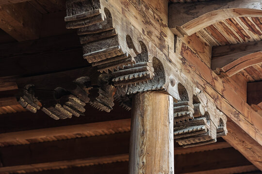 Wooden carved capitel of columns in the Juma Mosque. Famouse mosque of 10th century. Ceiling detail, close up. Khiva, Uzbekistan