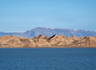 Unique Rock formations on Flintholmen island in Ekmanfjorden, Nordre Isfjorden National Park, Svalbard, Norway