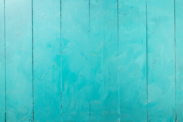 Blue painted wooden boards table, textured abstract backdrop