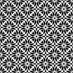 Seamless pattern with ethnic motifs in black and white. Vector illustration.