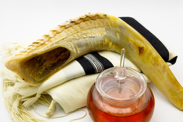 Shofar (horn), tallit, honey, apple  and pomegranate jewish traditional symbols .Rosh Hashanah...