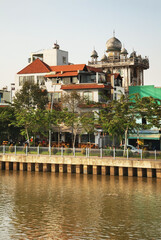 Embankment of Nhieu Loc - Thi Nghe channel in Ho Chi Minh. Vietnam - 645738120