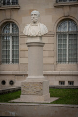 Obraz premium Chalons-en-Champagne, France - 09 01 2023: View of the statue of President of the Republic Sadi Carnot in front of Marne departmental archives building.