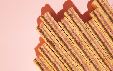 Wafer texture with raspberry and cocoa filling.