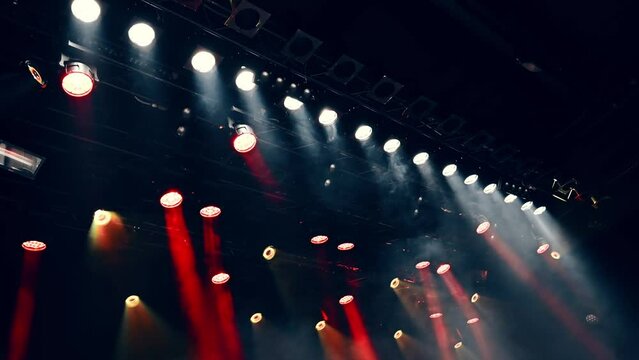 atmospheric stage light Lightning during the concert and show, working ceiling spotlights with concert fog