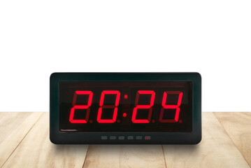 illuminated number 2024 on electric alarm clock screen on desk floor isolated on transparent, time signs for beginning or end of the year with copy space