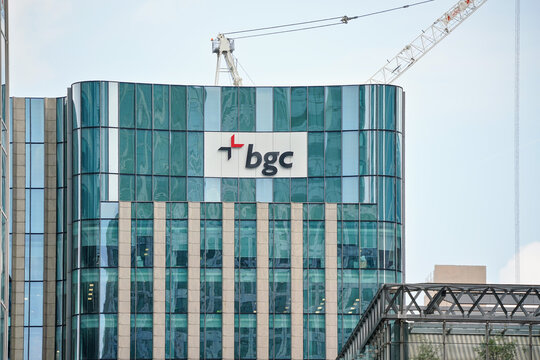 London, United Kingdom - May 18, 2023: BGC Partners company logo on their Europe headquarters in Five Canada Place. Bernard Gerald Cantor is international financial company founded 1945
