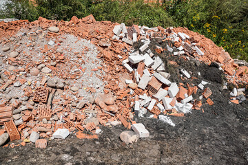 Heap of construction debris - broken pieces of bricks and concrete blocks