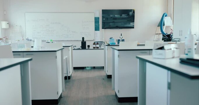 Science, classroom and education with empty room of laboratory for learning, chemistry and technology. Medicine, test and research with interior of school for college, medical and experiment