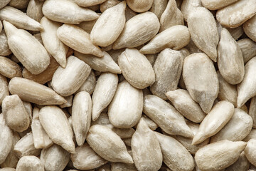 Sunflower seeds peeled in bulk, close-up, full depth of field
