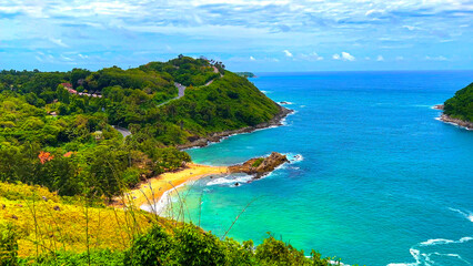 Ya Nui Beach and Nai Harn Beach in Phuket Thailand, turquoise blue waters, lush green mountains colourful skies. Phuket is a tropical island many palms teaming with wildlife and sea fisheries  - obrazy, fototapety, plakaty