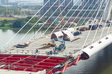 HO CHI MINH, VIETNAM - 13 Nov 2021 - There is a construction site located at the Thu Thiem 2 cable-stayed bridge.